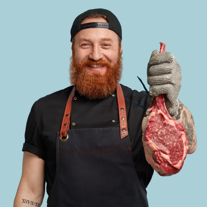 a butcher holds gifts for butcher